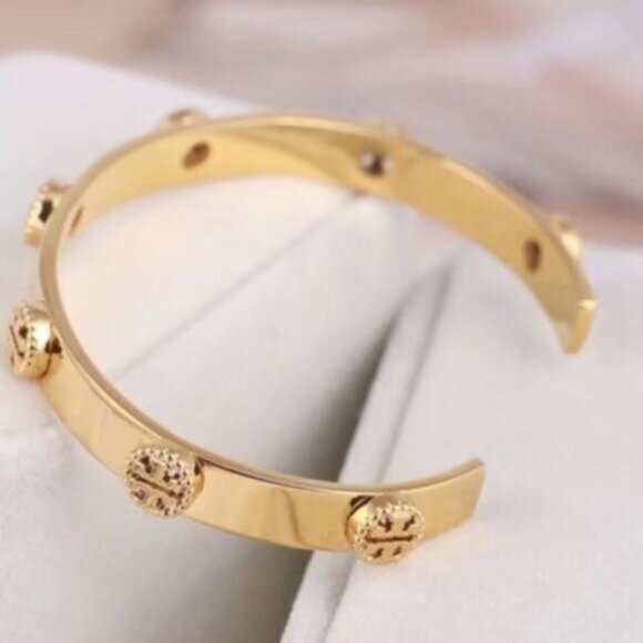 Tory Burch Gold Bracelet with Signature Emblems - Picture 2 of 4